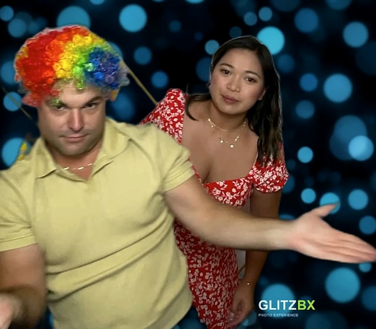 Guests hamming it up in a GLITZBX video booth clip